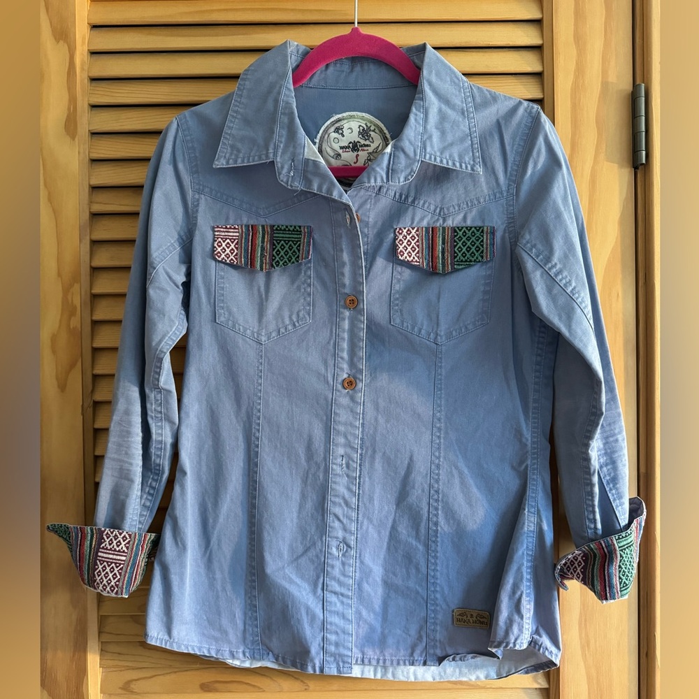 Long sleep bitten down with western accents on pockets and cuffs